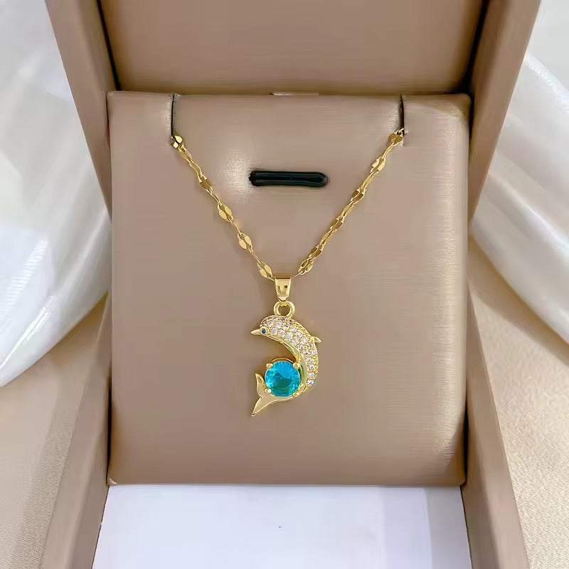 The Ocean Charm Blue Zircon Dolphin Pendant Necklace in Stainless Steel