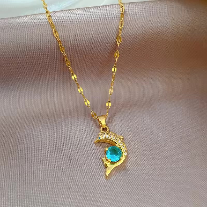The Ocean Charm Blue Zircon Dolphin Pendant Necklace in Stainless Steel