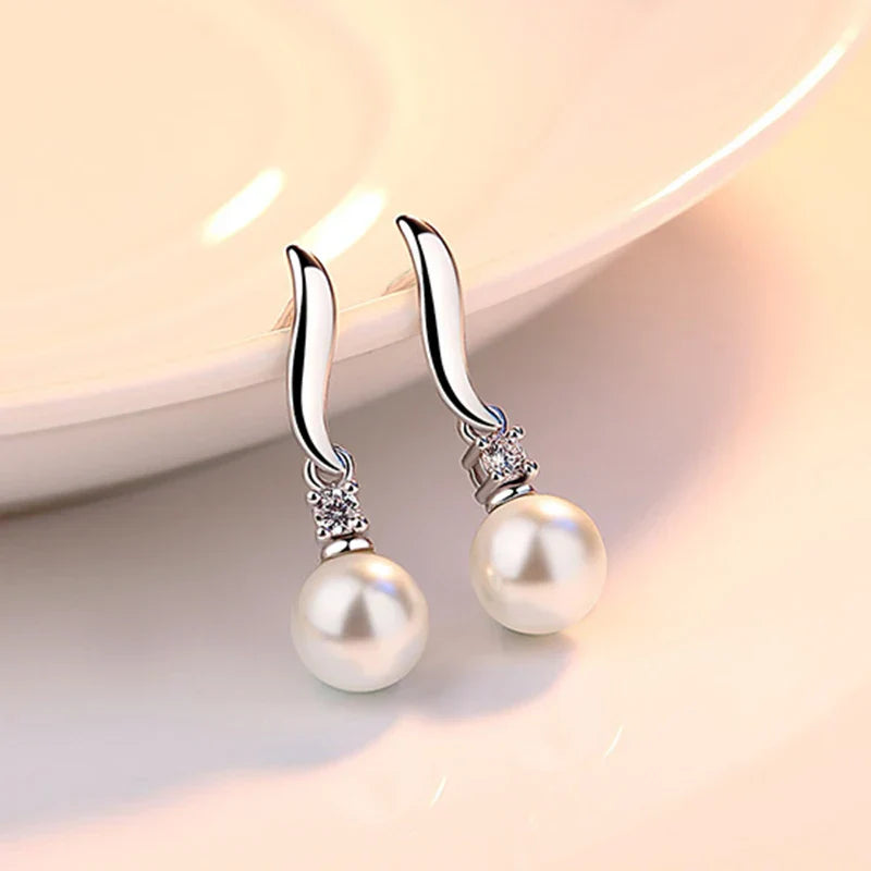 The Elegance Crystal Pearl Stud Earrings in Sterling Silver
