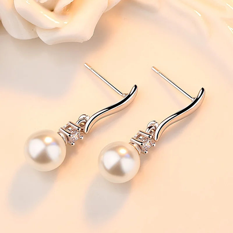 The Elegance Crystal Pearl Stud Earrings in Sterling Silver