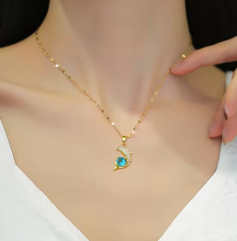 The Ocean Charm Blue Zircon Dolphin Pendant Necklace in Stainless Steel