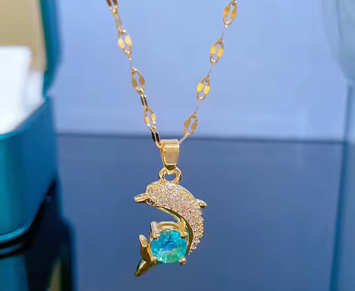 The Ocean Charm Blue Zircon Dolphin Pendant Necklace in Stainless Steel